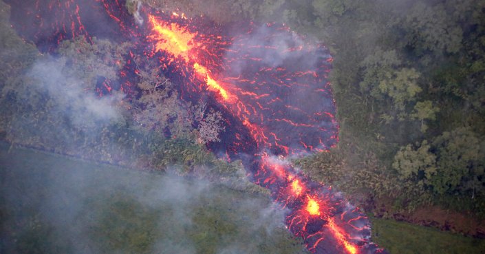 Lava erupts from a fissure east of the Leilani Estates subdivision during ongoing eruptions of the Kilauea Volcano